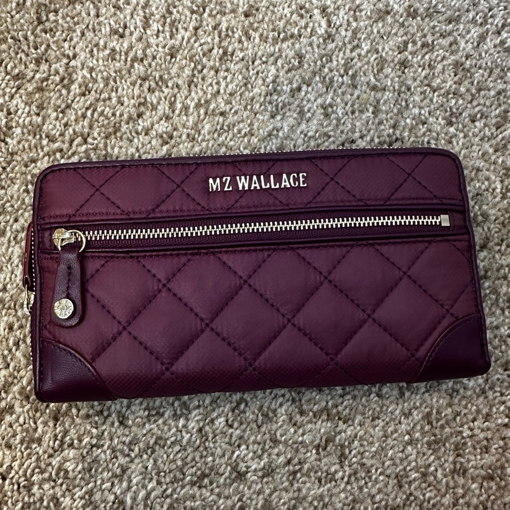 MZ Wallace Crosby Long Wallet in a purple or color crafted from quilted nylon
